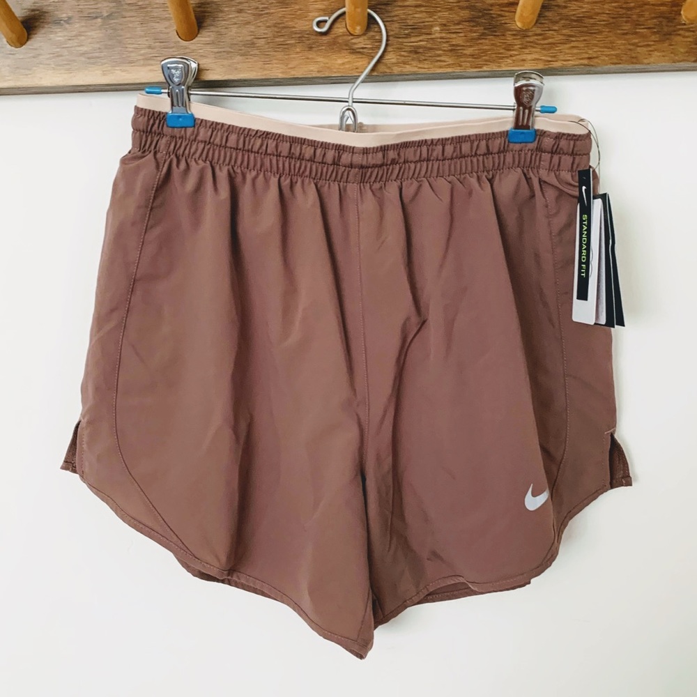 Nike light rose running shorts